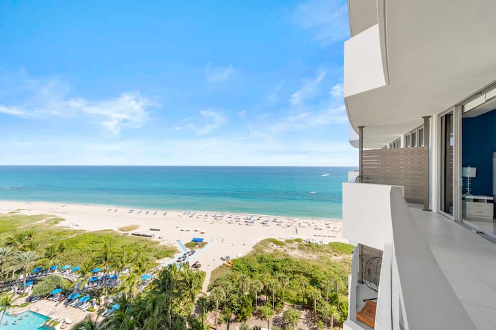 The balcony looking down over the resort pools and palms