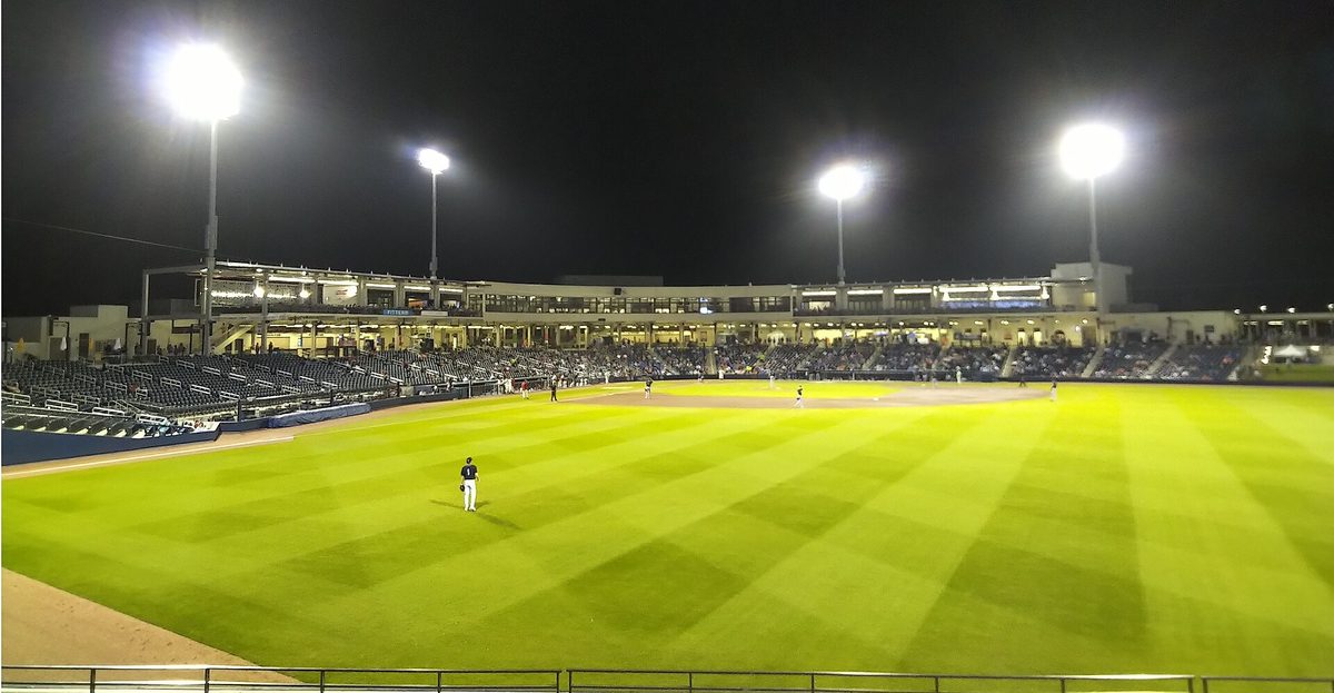 The ballpark in West Palm Beach now called CACTI Park of the Palm Beaches, seen from the outfield during an evening game under the lights